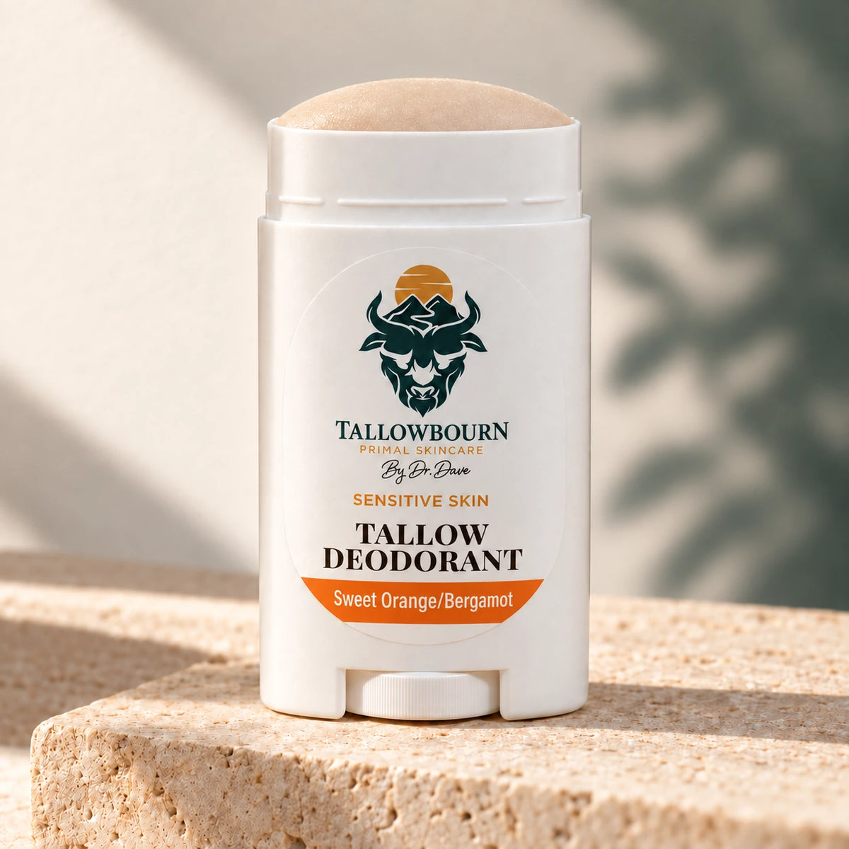 Open Sensitive Skin Tallow Deodorant stick in Sweet Orange/Bergamot on stone