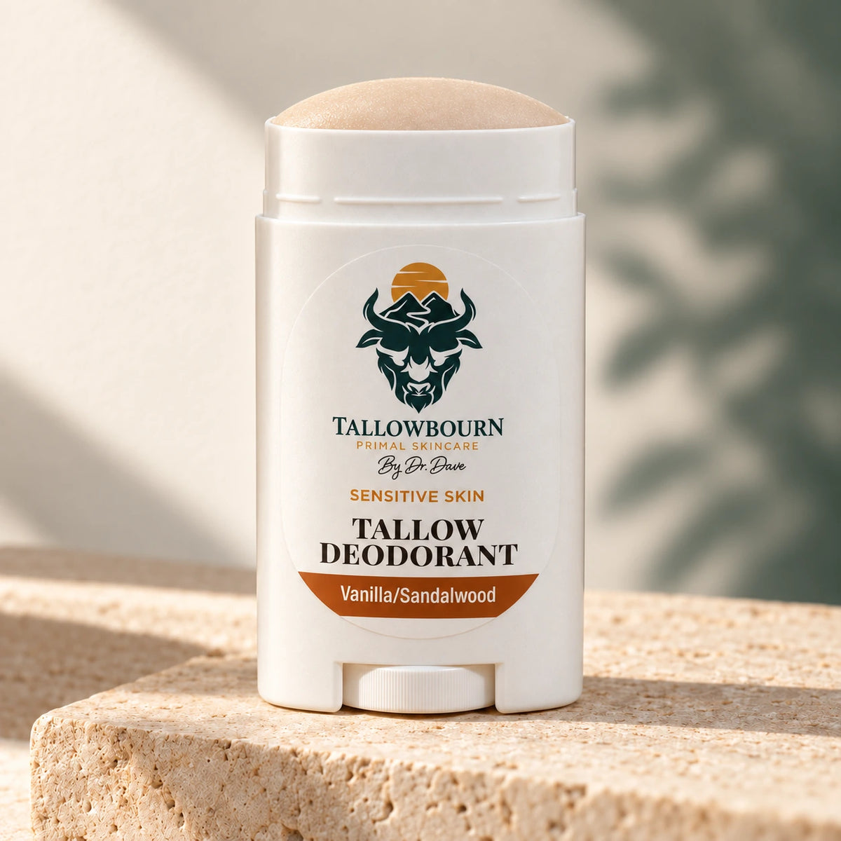 Open Sensitive Skin Tallow Deodorant stick in Vanilla/Sandalwood on a stone block