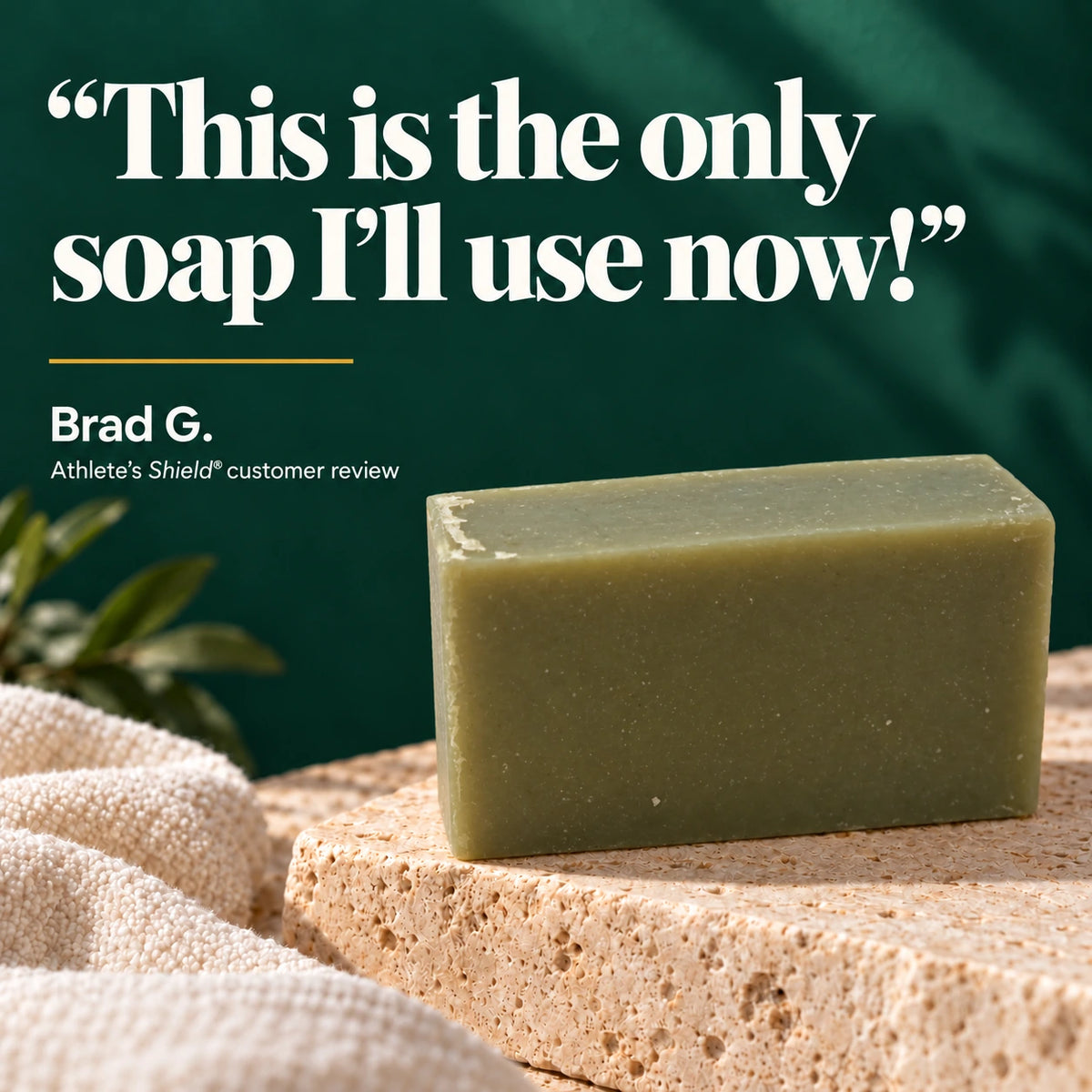 Olive-green Athlete's Shield soap bar with a customer review quote