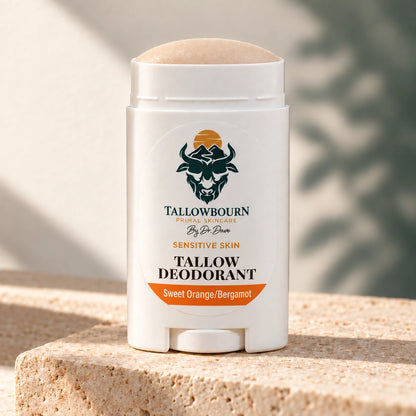Open Sensitive Skin Tallow Deodorant stick in Sweet Orange/Bergamot on stone
