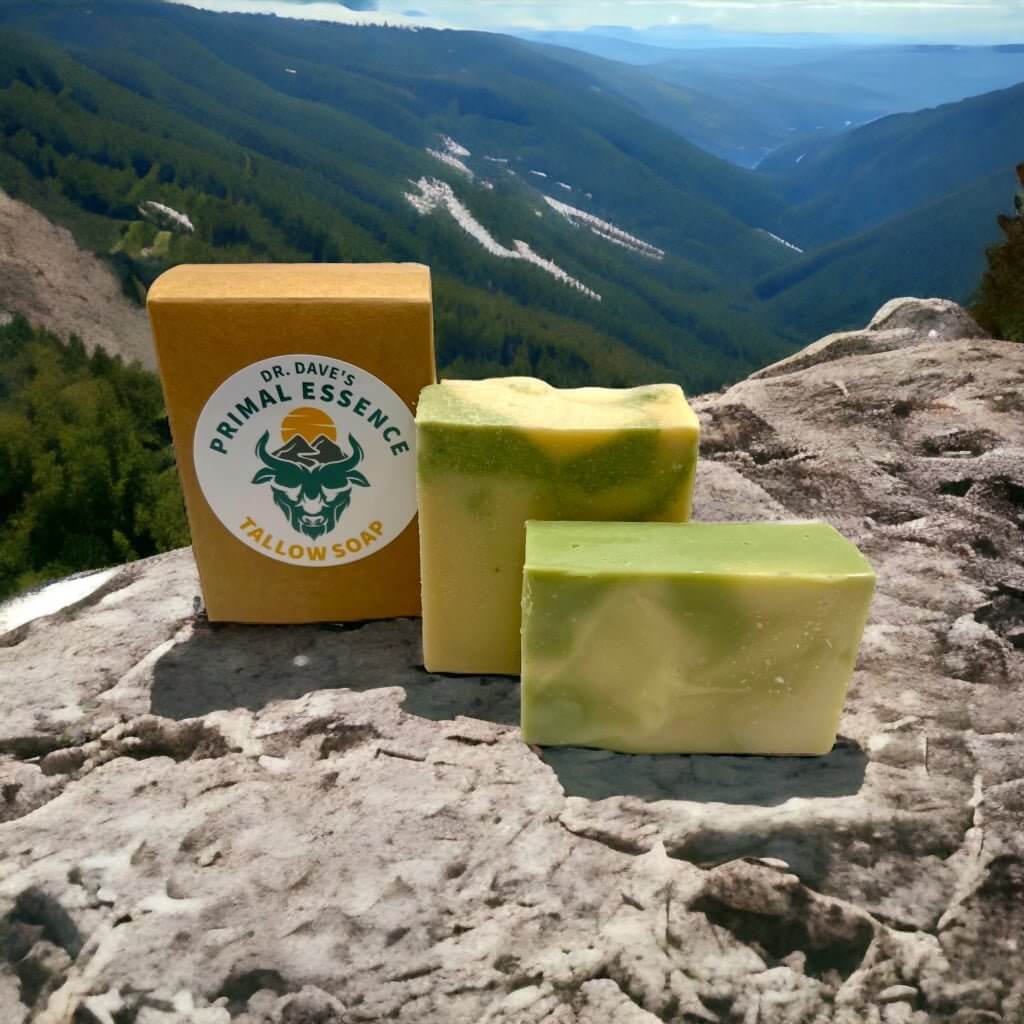 Three handcrafted soap bars stacked with a textured creamy surface.